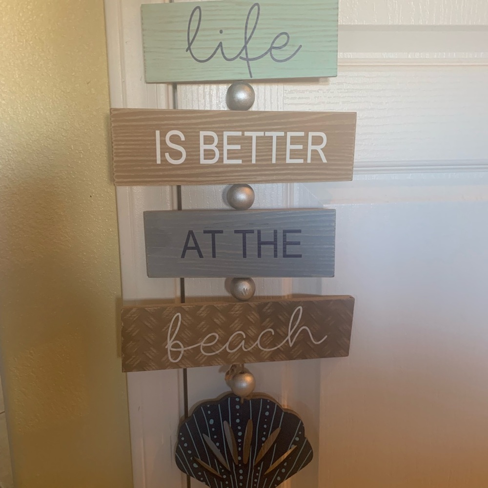 Hanging plaque, “life is better at the beach.” New without tags